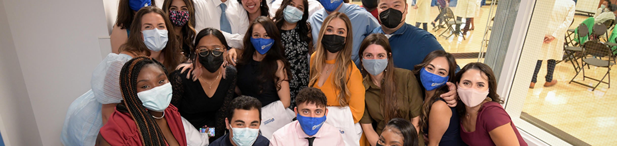 Group shot at white coat