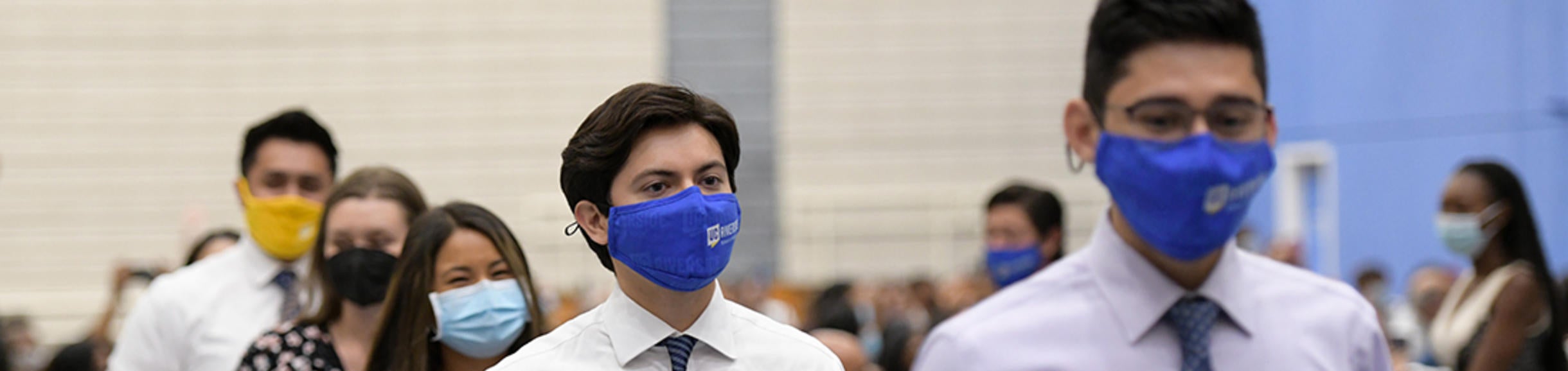 Medical students walking in the White Coat Ceremony