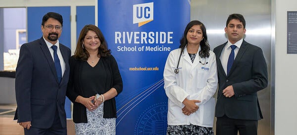 Gulati family photo at white coat